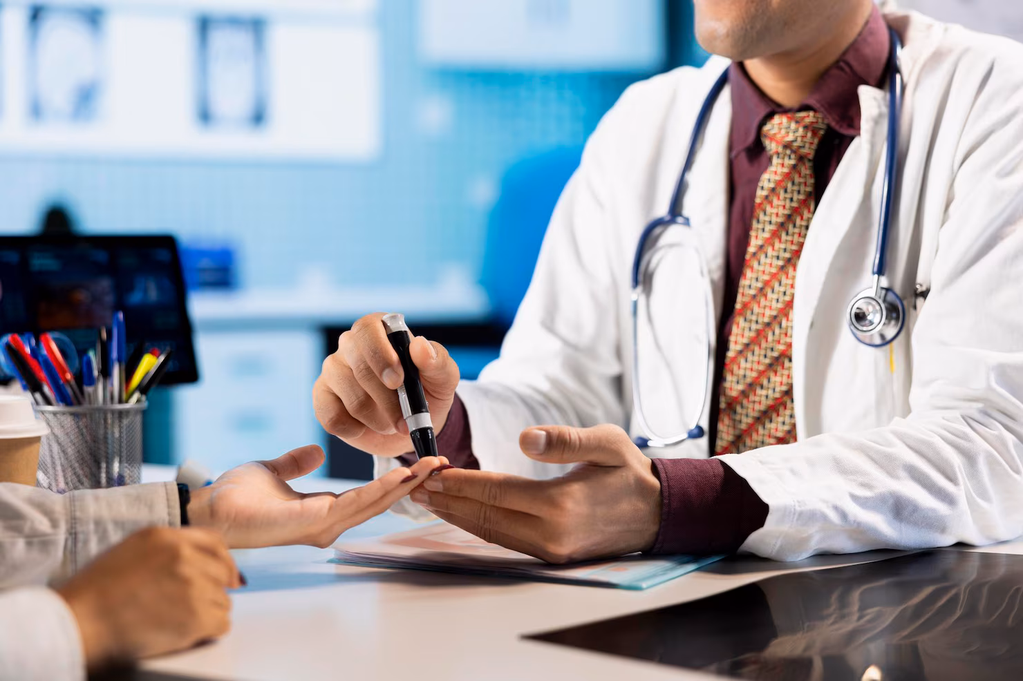 General physician consulting a patient at New Sigmaa Hospital